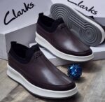 Clarks Brown Slip-On Sneakers with White Platform Sole