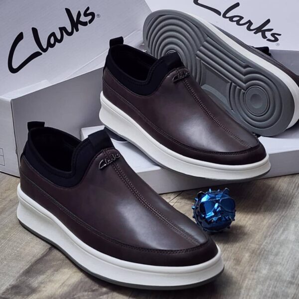 Clarks Brown Slip-On Sneakers with White Platform Sole