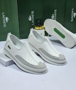 Lacoste White Slip-On Sneakers with Grey Suede Detailing