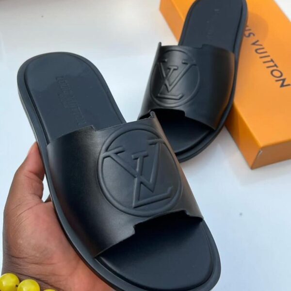 Louis Vuitton Black Flat Mules with Embossed LV Logo