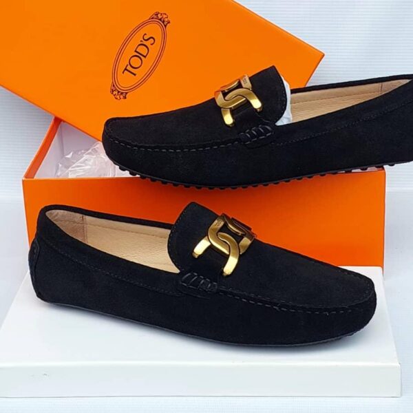 Tod’s Black Suede Loafers with Gold Chain